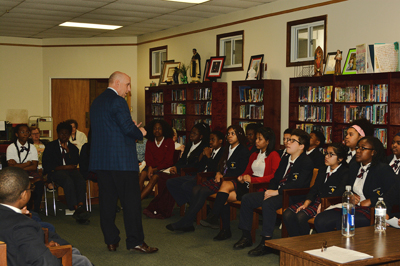 Lawyer Scott Griffith of Rawle & Henderson speaks to students at Holy Cross School