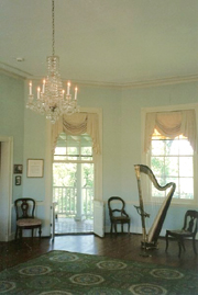 This photograph is of the beautiful octagonal room at Laurel Hill Mansion showing the porch door open.  From the back porch there is a beautiful view of the Schuylkill River.