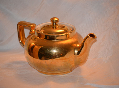 Photograph of a gold tea pot inviting citizens to the Spring Tea Fundraiser for Laurel Hill Mansion a historic park house in Philadelphia