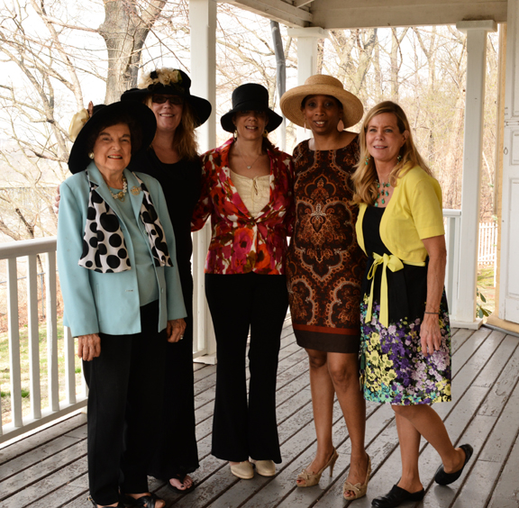 A few members of Women for Greater Philadelphia enjoy the fine weather on the rear porch of Laurel Hill Mansion after the 2014 Spring Tea