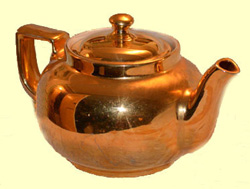 Golden Tea Pot symbolizing the Laurel Hill Mansion annual spring tea