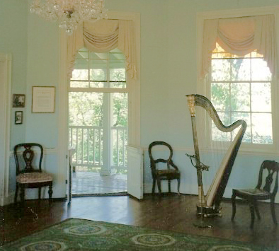 The music room at historic Laurel Hill Mansion with the jib door open